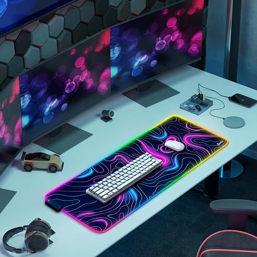 Gerlos RGB Gaming Mouse Pad, Large LED Desk Mat, 31.5 x 11.8 Inch | 12 light modes, non-slip base, water-resistant surface, stitched edges - color: Neon Pink