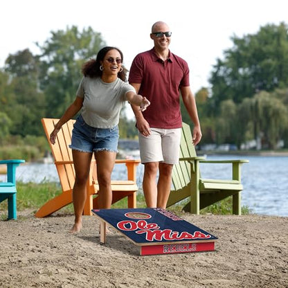 YouTheFan NCAA 2’ x 3’ Wood Cornhole Game with Logo Bags - color: Mississippi Rebels