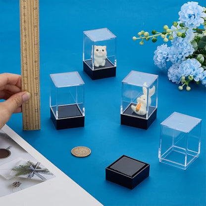 FINGERINSPIRE 4 Pcs Small Rectangle Plastic Collectibles Case 1.5x1.5x2.7inch Black Base Clear Lid Storage Box Mini Dustproof Protection Display Box for Action Figures Miniature Doll Models Crystals