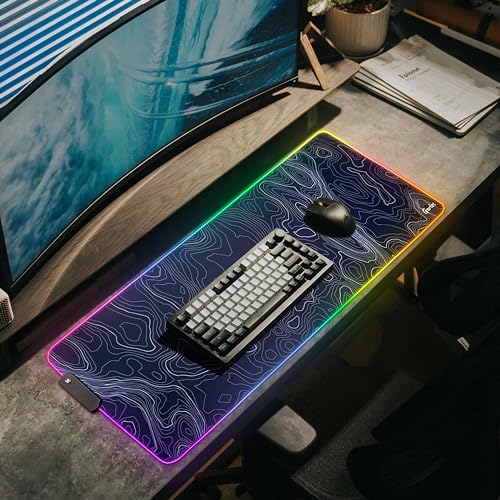 Gerlos RGB Gaming Mouse Pad, Large LED Desk Mat, 31.5 x 11.8 Inch | 12 light modes, non-slip base, water-resistant surface, stitched edges - color: Black