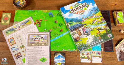 Asmodee Cozy Stickerville Board Game - Narrative Strategy Game of Village Building & Storytelling, Family-Friendly Fun for Kids & Adults, Ages 8+, 1-6 Players, 30 Minute Playtime
