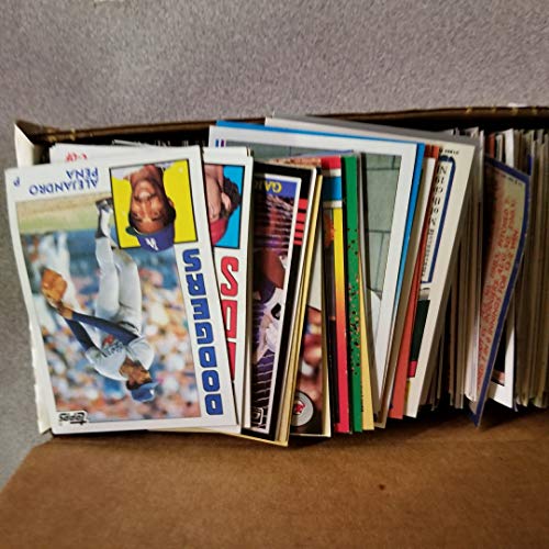 600 Baseball Cards Including Babe Ruth, Unopened Packs, Many Stars, and Hall-of-Famers. Ships in White Box Perfect for Gift Giving.